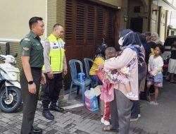 Wujudkan Anak Indonesia Sehat, Babinsa Danukusuman Bantu Kegiatan Posyandu